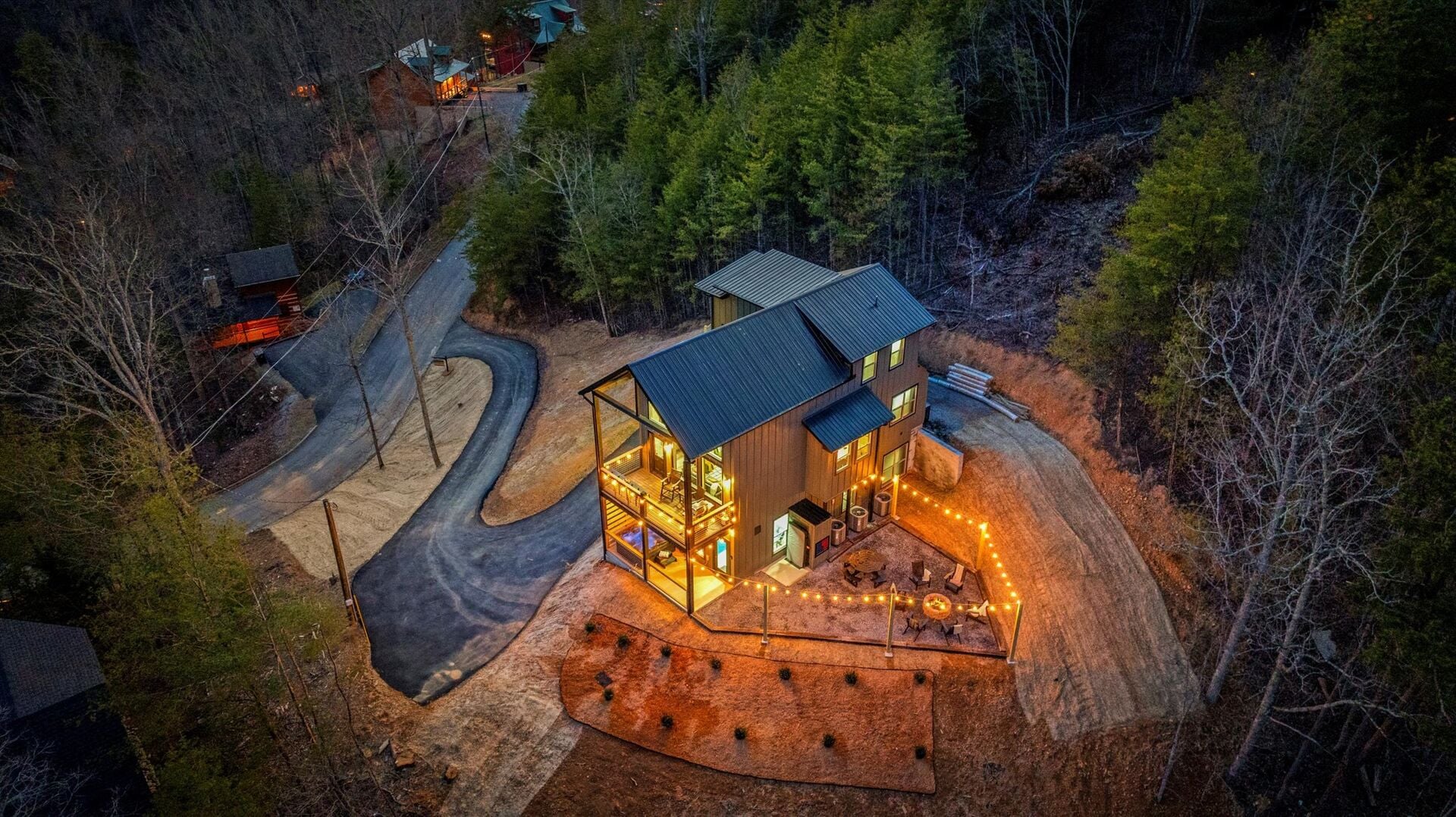 Bear Valley Estate cabin exterior at dusk in Sevierville, Tennessee